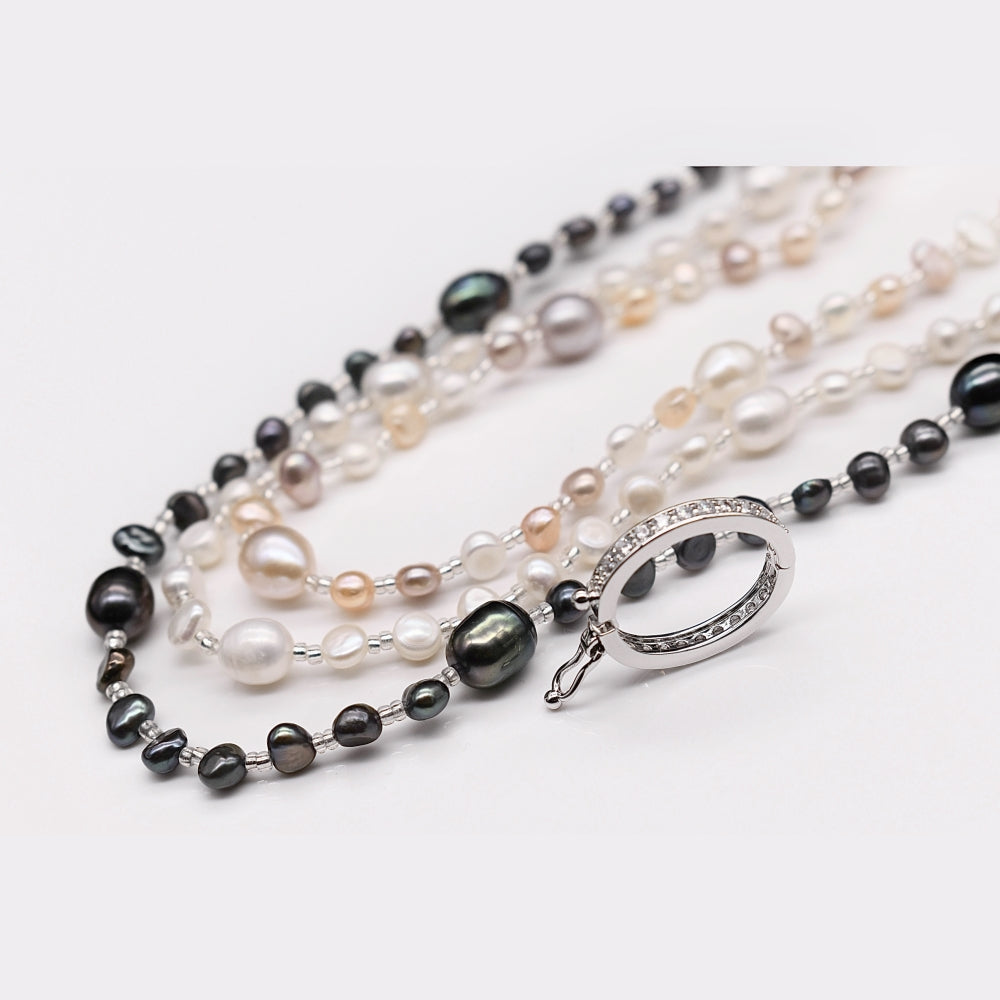 Chanel black and discount white pearl necklace