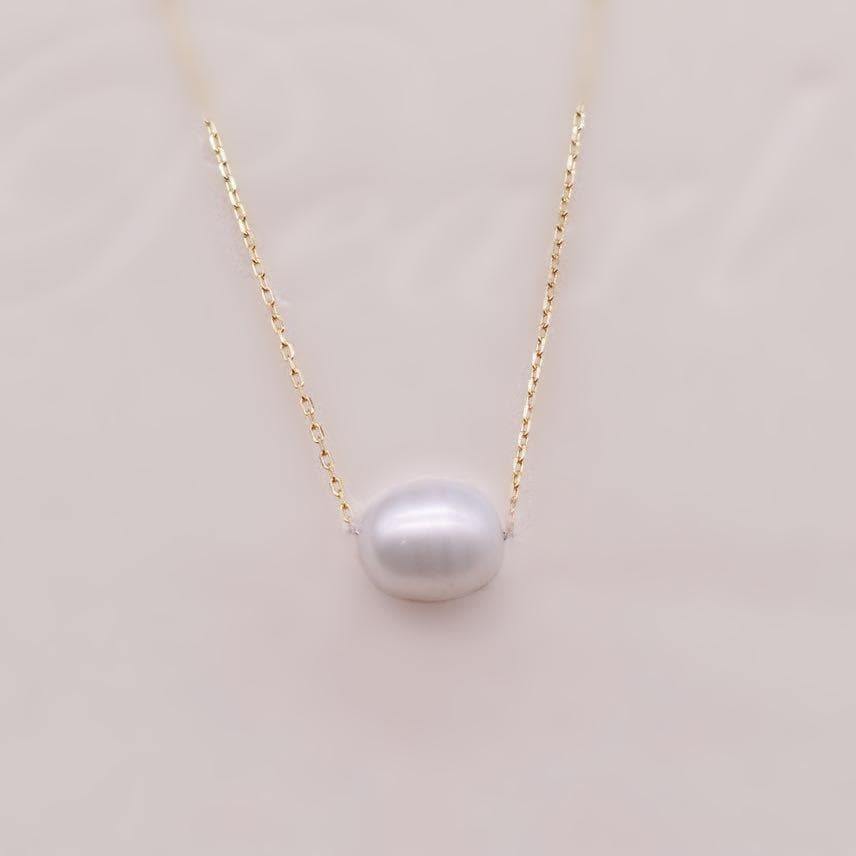 Floating pearl necklace store white gold
